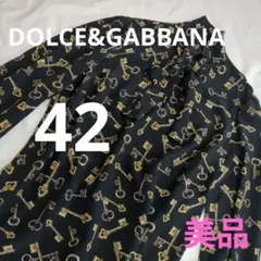 Dolce & Gabbana のドット柄 オフショルダー シルクの長袖ブラウス