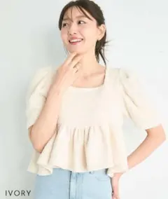 新品タグ付　ファンシーヤーン ペプラムトップスのサムネイル