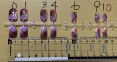 紫と赤のネイルチップ