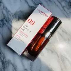 【新品未使用】CLARINS リップコンフォートオイル 09 チョコレートのサムネイル