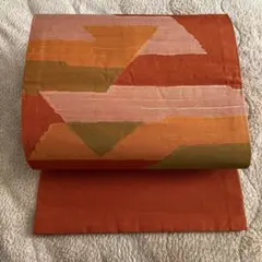 名古屋帯 オレンジ系 幾何学模様