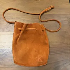 CK オレンジ スエード 巾着型ショルダーバッグ - メルカリ