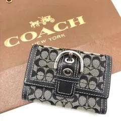 COACH 三つ折財布 バックル シグネチャーキャンバス レザー コンパクト