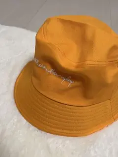 オレンジ バケットハット