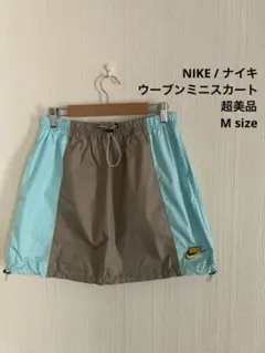 超美品 NIKE ナイキ ウーブンミニスカート 刺繍ロゴ 切り返し ドローコード