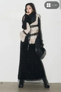 Andrea＆co. フェイクファーライダースベスト＋スパンコールスカート