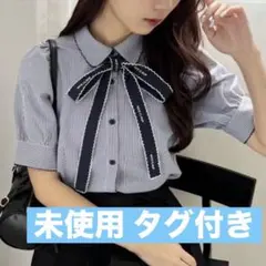 one after another nice claup ロゴボウタイブラウス