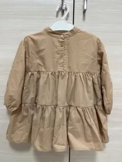 ベージュ ティアードスタイル 長袖チュニック　アースミュージックアンドエコロジー