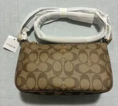 COACH（コーチ）シグネチャー トップ ハンドル ポーチ未使用　カーキ×サドル