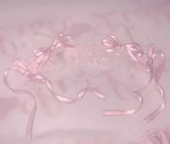 ピンク色の 猫耳ヘッドドレス