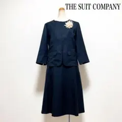 THE SUIT COMPANY