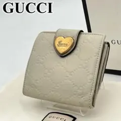 GUCCI 二つ折り財布 GG柄 シマレザー ゴールド金具 ハート Wホック