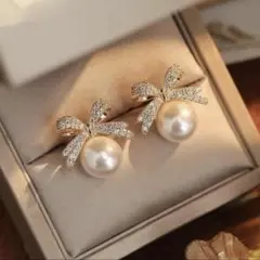 パール リボン ピアス ゴールド　上品 大人可愛い フェミニン