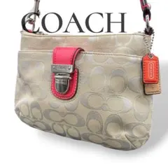 COACH シグネチャー ターンロック アクセサリーポーチ ピンクレザー