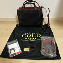 COCOCELUX GOLD ショルダーバッグ 黒/赤