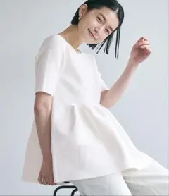 coca スポンディッシュニットペプラムトップス