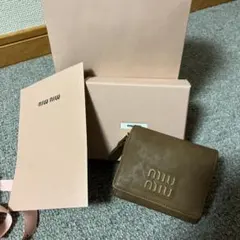 ミュウミュウ 二つ折り財布 ナッパレザー アンティーク加工 ピンク