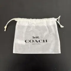 COACH ホワイトメッシュ巾着ポーチ