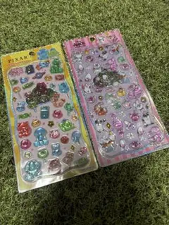 正規品　プチドロップステッカー　ディズニー2点　アリス　ピクサーキャンディ