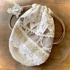 ミナペルホネンハンドメイドtambourineとナチュラルなレースいっぱい巾着。