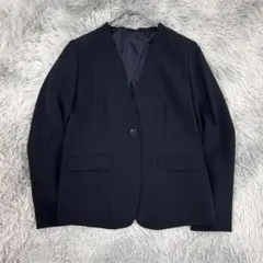 m6764【美品 リリヤーノ】ノーカラージャケット 洗濯可 伸縮性 紺色 11号