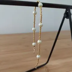 オフホワイトコットンパールとゴールドカラービーズのブレスレット