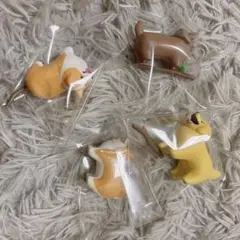 ガチャガチャ カプセルトイ いい感じの棒をゲットした犬