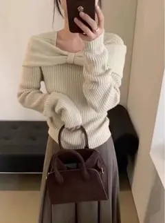 リボン付きオフショルダーリブニット