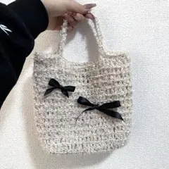 リボン付きクリーム色キラキラバッグ