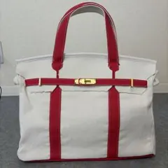 新品】キャンバスバッグ 赤 ゴールド金具 インナーバック付き - メルカリ