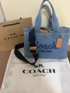 COACHコーチ大容量34cmデニムブルーカーゴトートバッグ - メルカリ
