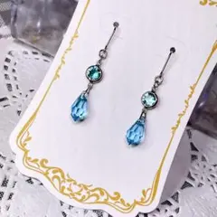 697 宝石質大粒ブルートパーズのポストピアス - メルカリ