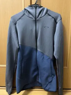 OAKLEY パーカー JPN L グレー/ブルー