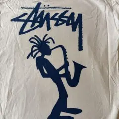 Stussy グレー トレーナー サックス奏者シャドーマン - メルカリ