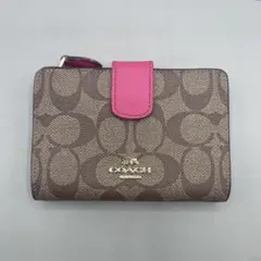 極美品✨️コーチ 二つ折り財布 フラップ シグネチャー PVC レザー 茶 ピンク