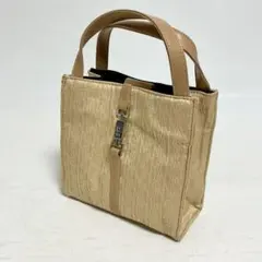 華やかなシャンパンゴールド NINA RICCIの上品なミニトート