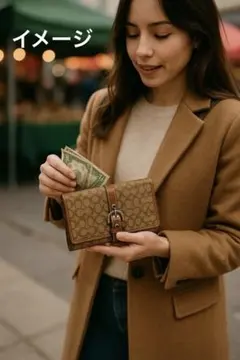 COACH ブラウンキャンバス折り財布