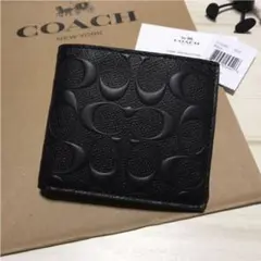 新品 COACH コーチ 折り財布 エンボス ブラック 黒色のサムネイル