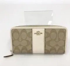 COACH コーチ 長財布 シグネチャー　ベージュ系　ロゴ入り　ラウンドジップ