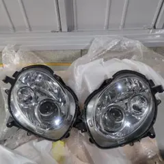 ミラココア後期LEDプロジェクタへッドライト左右取付部右は破損無し左