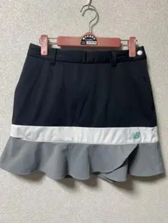 New Balance レディース ゴルフスカート 黒/グレー フリル裾