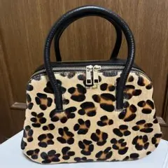 マディソン スポッテッド レオパード プリント ドーリー ダッフル クロスボディ マディソン スポッテッド レオパード プリント ドーリー ダッフル