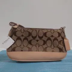 COACH（コーチ）　シグネチャー　レザー アクセサリーポーチ　ミニハンドバック