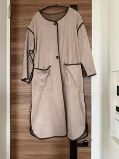 ベージュ ロングコート ポケット付き
