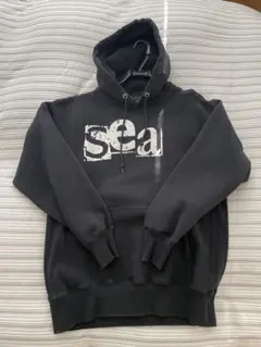 WIND AND SEA × GOD SELECTION XXXコラボパーカー