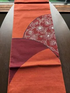 アンティーク袋帯☆O1朱のベースに花や蔦などのデザイン