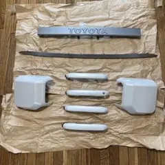 新品未使用品】ランクルFJ 給油口カバー タイトヨタ純正 - メルカリ