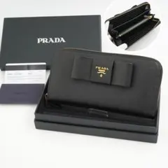 ✨Sランク・箱保証書付き✨　PRADA 長財布　サフィアーノレザー　リボン　黒色