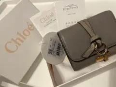 Chloé クロエ　グレー 三つ折り財布　財布　ｒチャーム付き
