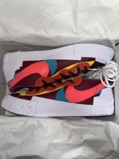 KAWS × sacai × Nike Blazer Low Team Red